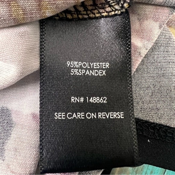 Torrid Black Floral Studio Knit Wrap Peplum Top Size 4 - Picture 9 of 10